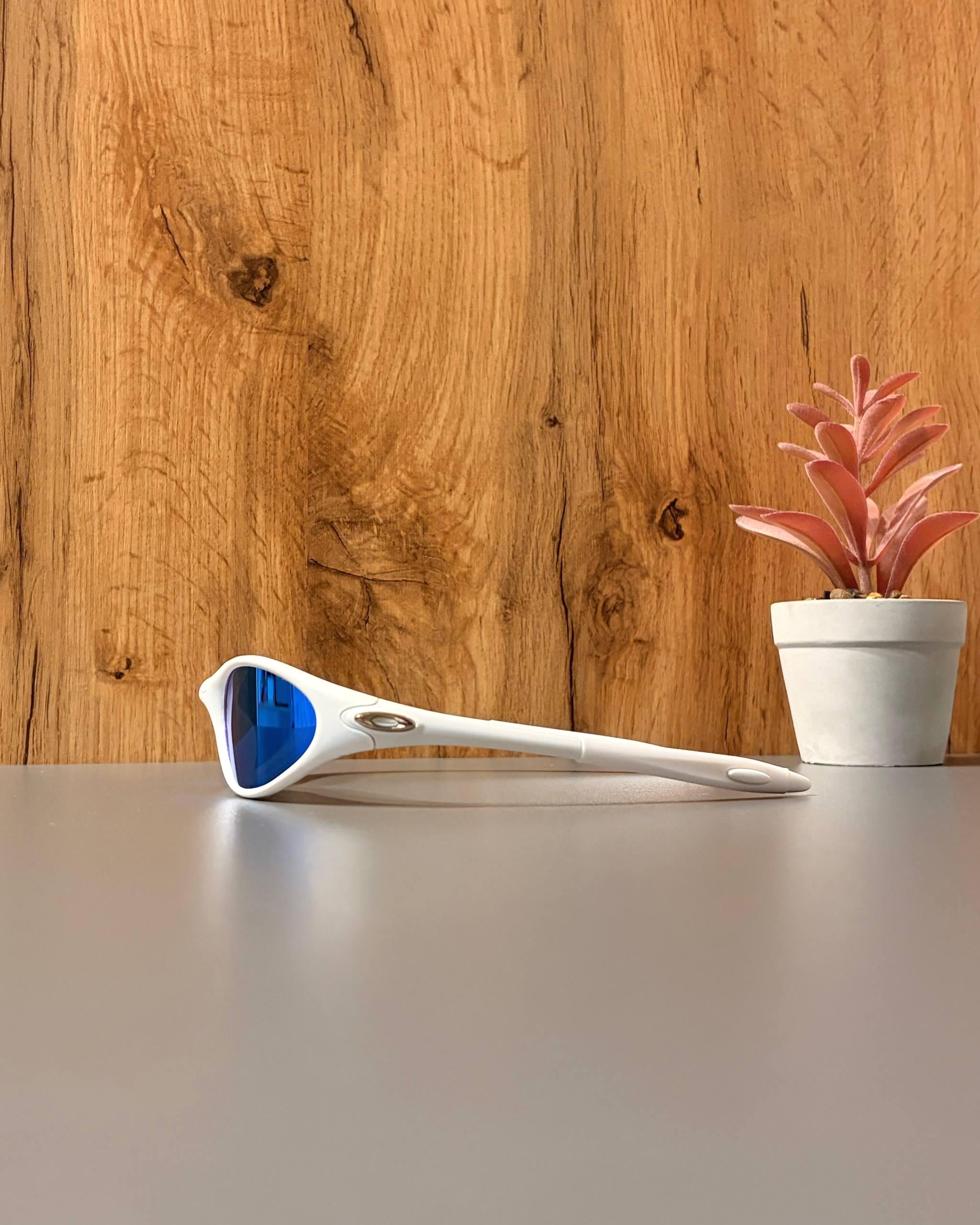 Oakley Minute 1.0: White Wrap Sunglasses W/ Blue Iridium Lens