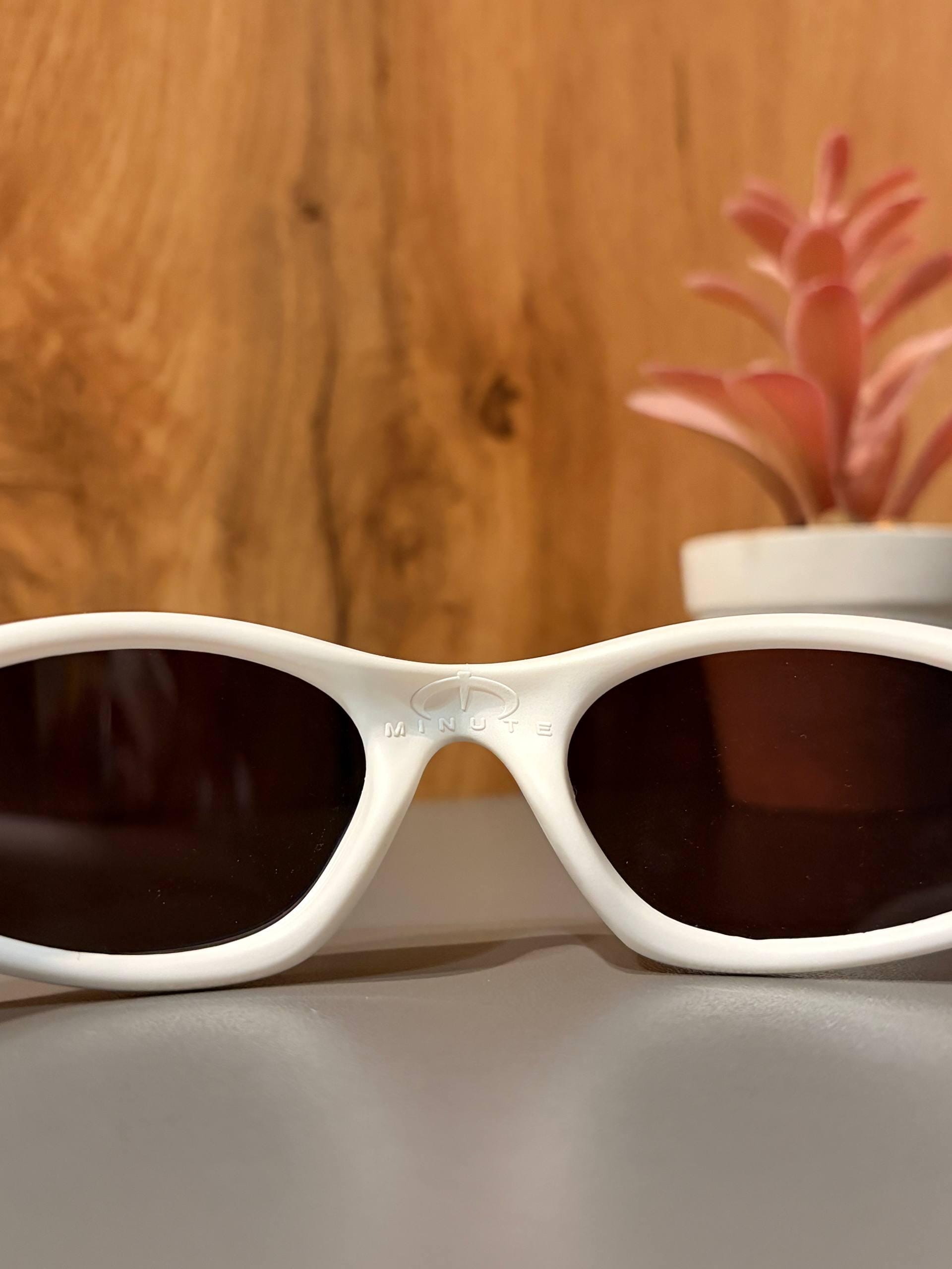 Oakley Minute 1.0: White Wrap Sunglasses W/ Blue Iridium Lens