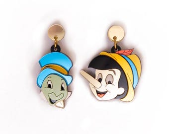 Örhängen med Pinocchio och Pepito Grillo