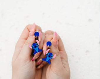 Par handgjorda örhängen i plexiglas och rostfritt stål - Stitch