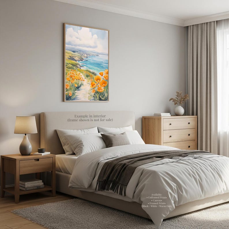 a serene bedroom with a large bed, wooden nightstands, and a painting of a coastal landscape hanging on the wall.