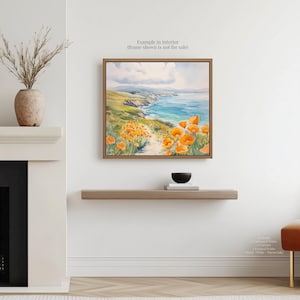 a painting of a coastal landscape with a path leading through a field of orange flowers, hanging on a wall above a wooden shelf.