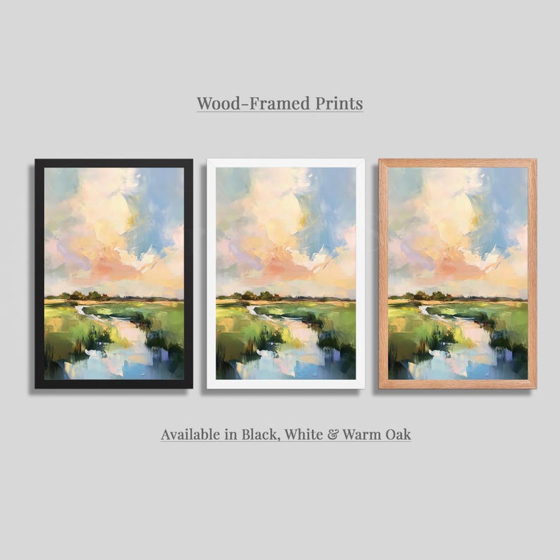 three framed prints of a landscape painting, each in a different frame color: black, white, and warm oak.