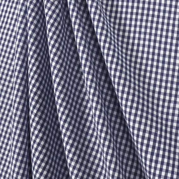Navy Blue and White Gingham 1/8" checks. 60" wide 65percent Polyester 35percent Cotton