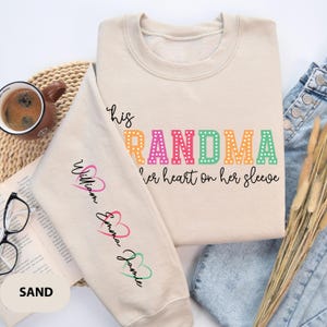 Grandma Heart On Sleeve Sweatshirt: Custom Grandchild Names