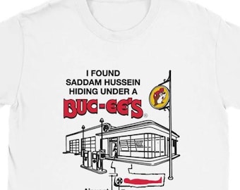 parody tee | "i found saddam hussein hiding under a" | history buffs | college style | streetwear | gildan cotton unisex