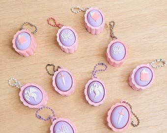 Pastel Fantasy Clicker Keychains – Dragon, Book, Sword & Butterfly