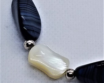 Obsidian and Mother of Pearl (Abalone) Necklace with Silver Plated Accent Beads.