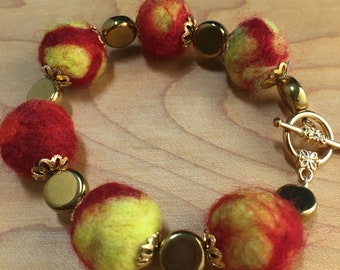 Red and Yellow Wool Bead Bracelet with Gold Accents