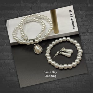 Conjunto de joias de pérola branca: colar, pulseira e brincos pendentes