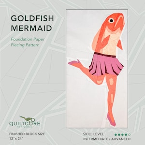 May include: A foundation paper piecing pattern titled "Goldfish Mermaid." The design features a whimsical illustration of a goldfish wearing a pink pleated skirt and high heels. The finished block size is 30.5cm x 61cm. Skill level is intermediate to advanced.
