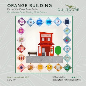 May include: A quilt pattern featuring an orange building design, part of the Fussy Town Series. The quilt is 20" x 20" and includes a variety of colorful, diamond-shaped blocks surrounding the building. The skill level is beginner to intermediate.