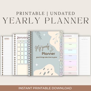 以下が含まれることがあります： 日付なしの印刷可能な年間プランナー。青とベージュの表紙に「My yearly planner, good things take time to grow」の文字が書かれています。プランナーには、月間カレンダー、週間プランナー、ノートページが含まれています。