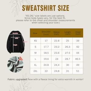 May include: A size chart for sweatshirts, with measurements in inches for sizes XS to 2XL. The chart includes shoulder, sleeve, length, and chest measurements. The text states that the fabric has been upgraded with a fleece lining for extra warmth.
