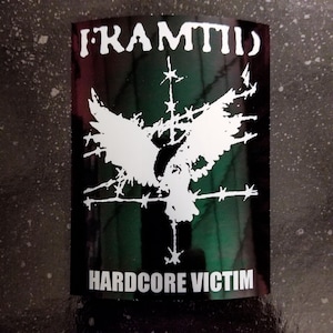 May include: Black and green sticker with a white eagle design and the text "FRAMTID HARDCORE VICTIM".