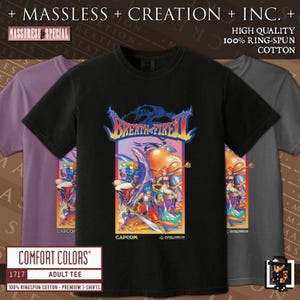 May include: Three adult t-shirts in black, purple, and gray, featuring a colorful graphic from the video game "Breath of Fire II." The shirts are made of 100% ring-spun cotton. The text "Comfort Colors" and "1717" are also visible.