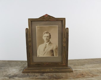 Antique Tilt Frame Portrait: Sepia Photograph of Man