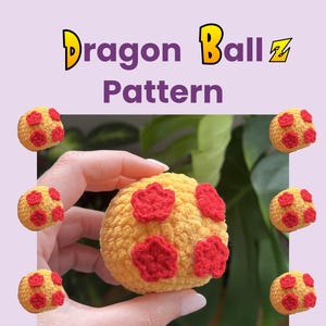 May include: A crocheted yellow ball with red flower-shaped accents, held in a hand. The image includes the text "Dragon Ball Pattern" in yellow and purple. Additional crocheted balls are scattered around the main object.