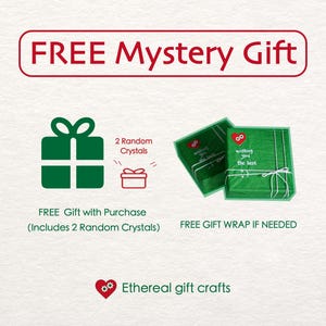May include: An advertisement for a free mystery gift. The image shows a green gift box, two wrapped presents, and text that reads "FREE Mystery Gift." The text also mentions "2 Random Crystals" and "FREE GIFT WRAP IF NEEDED."