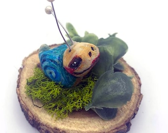 Polymer clay snail art