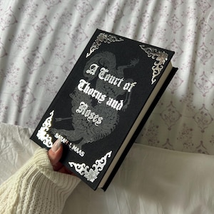A Court Of Thorns and Roses rebind special edition by Sarah J. Maas - booktok, bookish, sprayed edges