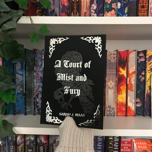 A Court Of Mist and Fury rebind special edition by Sarah J. Maas - booktok, bookish, sprayed edges