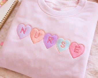 Embroidered Nurse Sweatshirt, Candy Heart Nurse Crewneck, Pastel RN Pullover, Cute Nursing Outfit Gift For Her, Sweet Coquette Style
