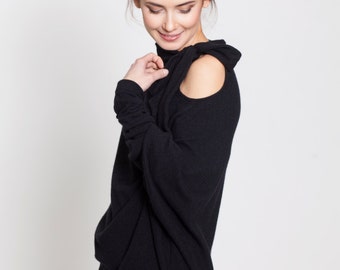 black sweater with bow on shoulder