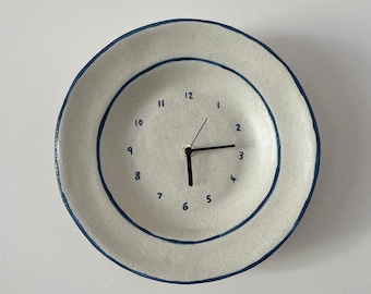 Ceramic clock with blue trim