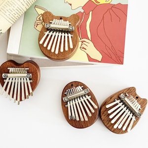Kalimba de bolsillo, mini piano de pulgar, carpintería hecha a mano, imprescindible para los amantes de la música, amuleto decorativo divertido, que brinda compañía melódica.