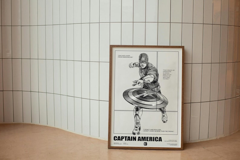 May include: A framed poster featuring a black and white illustration of Captain America throwing his shield. The poster has the text "I'm just a kid from Brooklyn" and "The price of freedom is high, but it's a price I'm willing to pay."