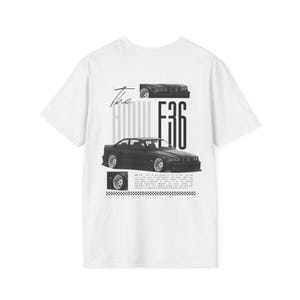 May include: White t-shirt featuring a black and white graphic of a car with the text "The E36". The design includes multiple car images and text, with a checkered pattern at the bottom. The shirt is a classic crew neck.