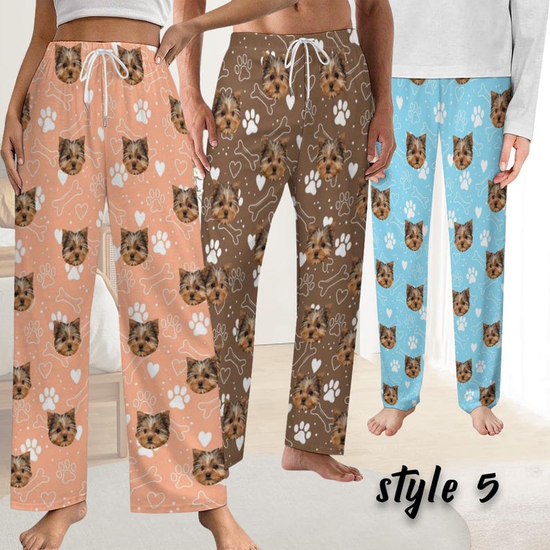 May include: Three pairs of pajama trousers in peach, brown, and light blue. Each pair features a repeating pattern of Yorkshire Terrier faces, paw prints, and bones. The trousers have a drawstring waist and a relaxed fit. The text "style 5" is at the bottom.