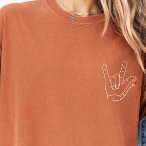 Autism mom shirt featuring sign language design and meaningful quote. Great support tee for special education teachers, awareness walks, or everyday autism advocacy.
