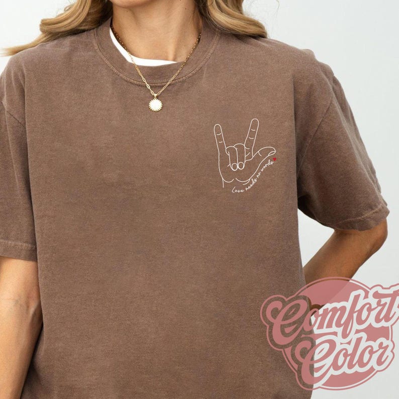 Love Needs No Words autism shirt with hand sign outline. Comfortable awareness tee for autism support teams, SPED teacher gift, or autism awareness month apparel.