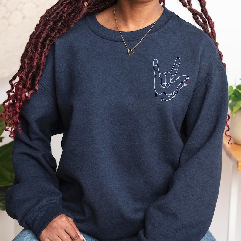 Yellow autism support shirt with sign language hand symbol and text. Ideal for autism moms, caregivers, and SPED teachers spreading love and awareness.
