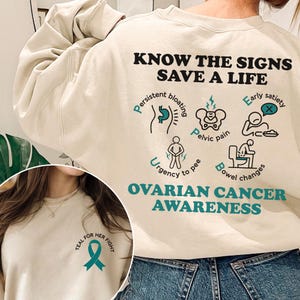 El signo del cáncer de ovario salva vidas: camiseta de concientización sobre el cáncer, equipo de apoyo a los ovarios, camiseta de lucha contra el cáncer, en septiembre uso un lazo verde azulado.