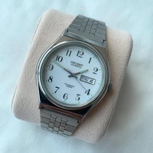 Relógio masculino vintage Orient Swimmer Quartz UG00-C0, fabricado no Japão, 34 mm