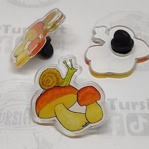 Escargot & Porcini Lapel Pin by TursiArt. Acrylic Collectible Button, Snail and Mushroom. Limited run of 50 pieces manufactured in USA