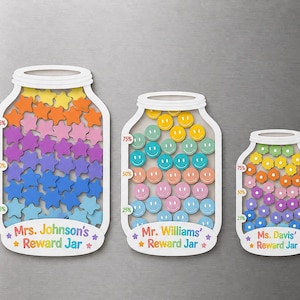 May include: Three white jar-shaped magnets with percentage markers. The first jar contains orange, pink, purple, and blue stars labeled Mrs. Johnson's Reward Jar. The second has yellow, teal, and pink smiley faces labeled Mr. Williams' Reward Jar. The third has flower shapes labeled Ms. Davis' Reward Jar.