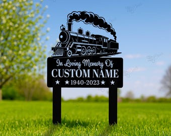 May include: Black metal memorial garden stake featuring a detailed silhouette of a steam train. The sign reads "In Loving Memory Of CUSTOM NAME 1940-2023" with star accents. The stake is designed for outdoor use.