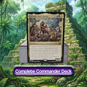 May include: A trading card titled Gishath, Sun's Avatar featuring a dinosaur illustration, resting on a stack of cards. The card text includes Vigilance, trample, haste, and game mechanics. Below the stack, a purple banner reads Complete Commander Deck.