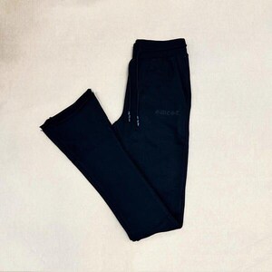 May include: Black sweatpants with a wide leg and a small "CWSC" logo on the left leg.