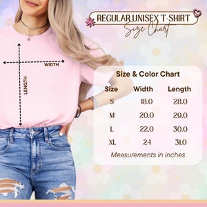 May include: A size chart for a regular unisex t-shirt featuring a light pink shirt with dashed lines indicating width and length. A table lists sizes S, M, L, and XL with corresponding width and length measurements in inches ranging from 18.0 to 31.0.