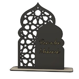 May include: A black laser-cut wooden Ramadan Mubarak decoration. The design features an arched silhouette with a geometric star pattern and the words "Ramadan Mubarak" in a decorative font.