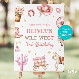May include: A pink and brown Wild West themed birthday party sign with the text "Welcome to Olivia's Wild West 3rd Birthday". The sign features a pink cowboy hat, a cactus, a wagon, a horse, and a guitar.