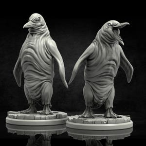 May include: Two grey, stylized penguin sculptures. One penguin has its beak closed, the other has its beak open. Both sculptures have outstretched arms and are standing on a circular base. The sculptures have a textured, rippled appearance.