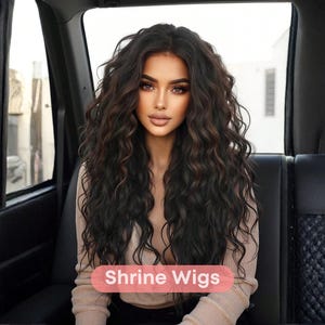 May include: A person with long, wavy, dark brown hair with highlights, seated in a car. The hair is styled in loose curls. The text "Shrine Wigs" is displayed on a pink banner at the bottom of the image.