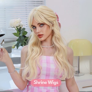 May include: A woman with long, wavy blonde hair and a pink gingham dress. She wears a pearl necklace and earrings. The image includes a wine glass with red wine and the text "Shrine Wigs".