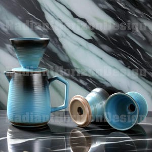 May include: A blue and black ceramic coffee pour-over set. The set comprises a carafe, a dripper, and a lid, all with a ribbed texture. The background features a marble-effect surface. The set is designed for brewing coffee.